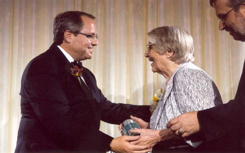 Jean Receives Fellow Award | As a Computer History Museum Fellow, Jean Jennings Bartik joins such pre-eminent computing figures as Digital Equipment Corp. founder Ken Olsen, Apple's Steve Wozniak, programming language pioneer Grace Murray Hopper and Tim Berners-Lee, who made seminal contributions to the development of the World Wide Web. Left: Tim Bartik, Jean's son. Center:  Jean Jennings Bartik. Left: John C. Holler, president and CEO of The Computing History Museum at Mountain View. (Courtesy of Dr. Jon Rickman, Vice President of Information Technology, Northwest Missouri State University.)