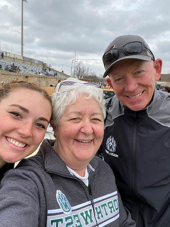 Bob and Susan Tucker attended a track and field meet last spring to cheer on their niece, 安娜·格莱斯顿(右), a sophomore human services major at Northwest and a  member of the Bearcat track and field team. (提交的图)