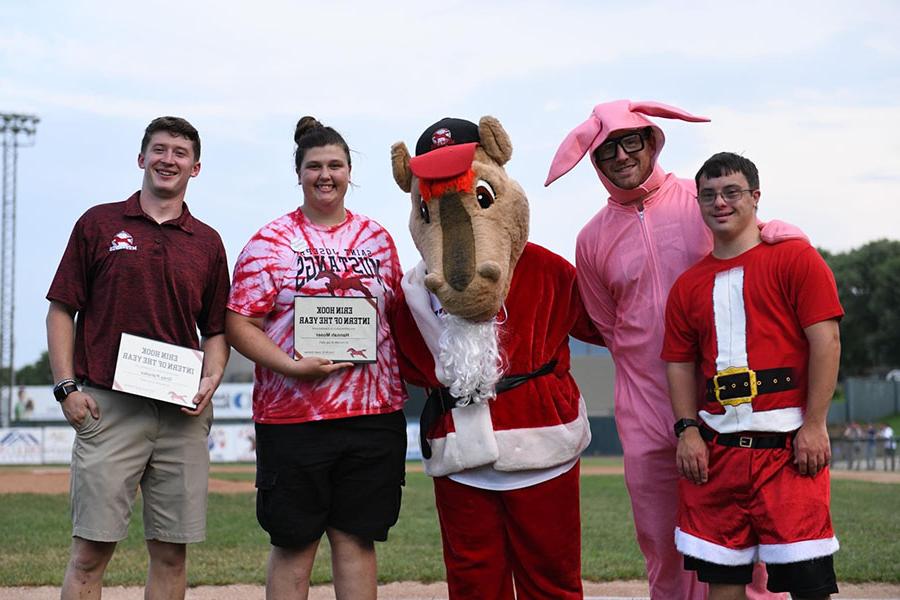 Northwest student Hannah Moser (second from right) worked as a summer intern with the St. Joseph Mustangs Baseball Organization and was recognized as one of its outstanding interns. Moser was one of about 250 Northwest students to complete summer internships this year. (Submitted photos)