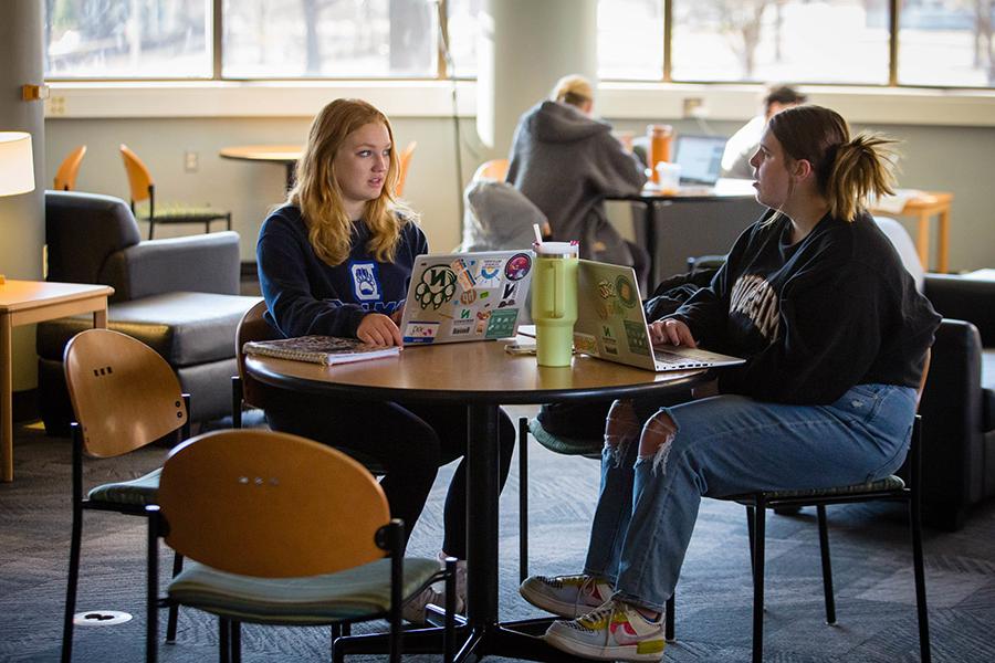 Students study in the B.D. Owens Library. In addition to textbooks, Northwest provides laptops to students as part of their tuition, ensuring they have access to the tools they need to be successful in the classroom. (Photo by Abigayle Rush/Northwest Missouri State University)