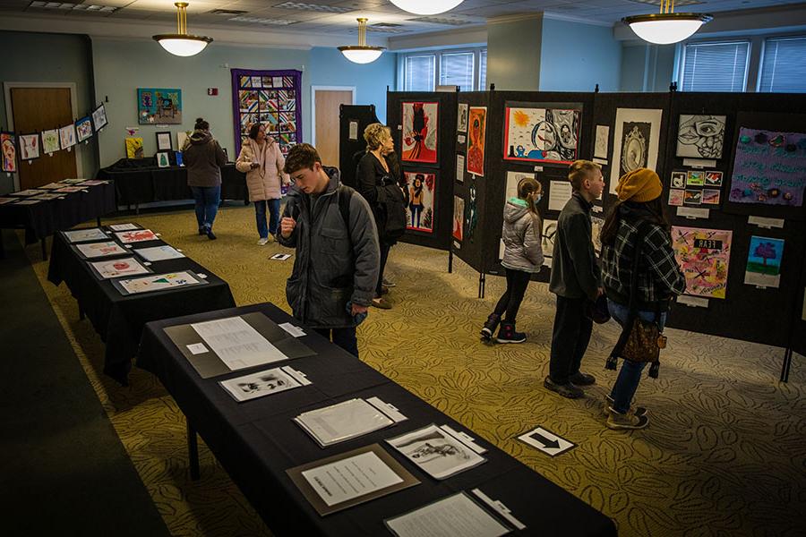 Patrons view an art exhibit during the 2022 "I Will Listen" event in the Student Union. (Photo by Lauren Adams/Northwest Missouri State University)